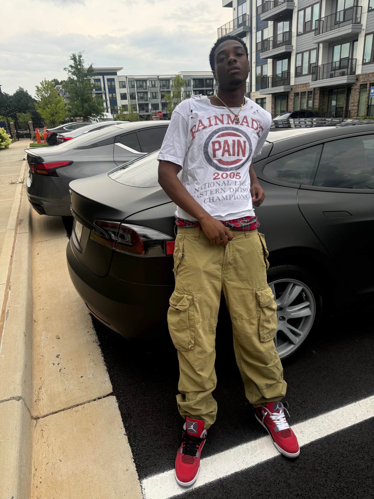 Pain Made Us Champions Slasher Tee